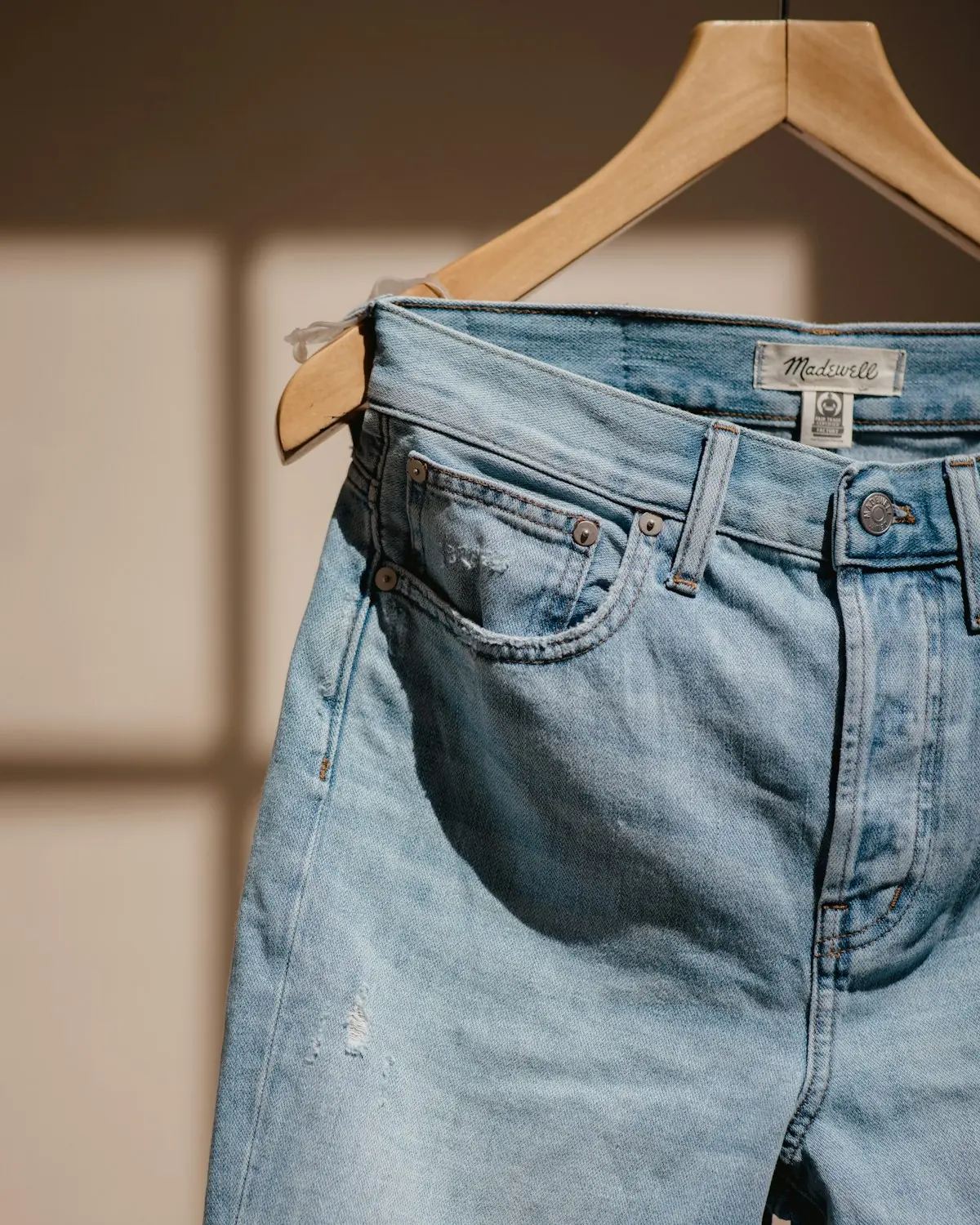 Model in washed denim jeans from the RainbowTex heritage denim line