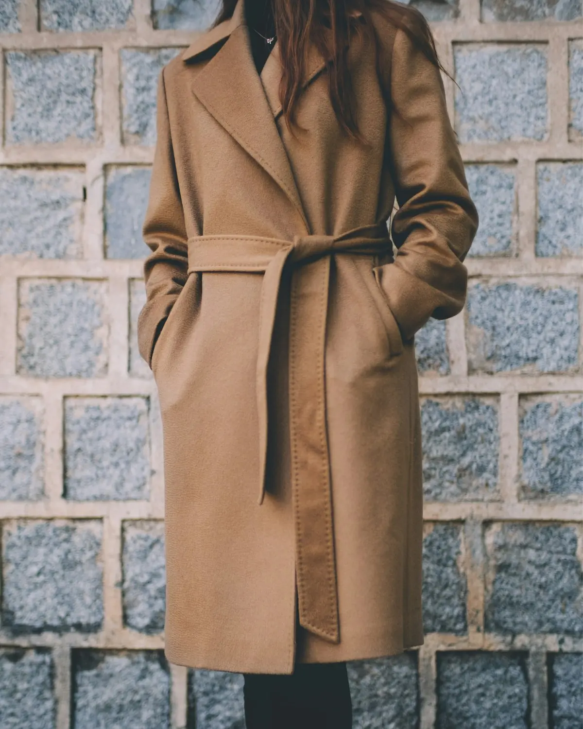 Model in a heavy winter coat from the RainbowTex cold-climate line